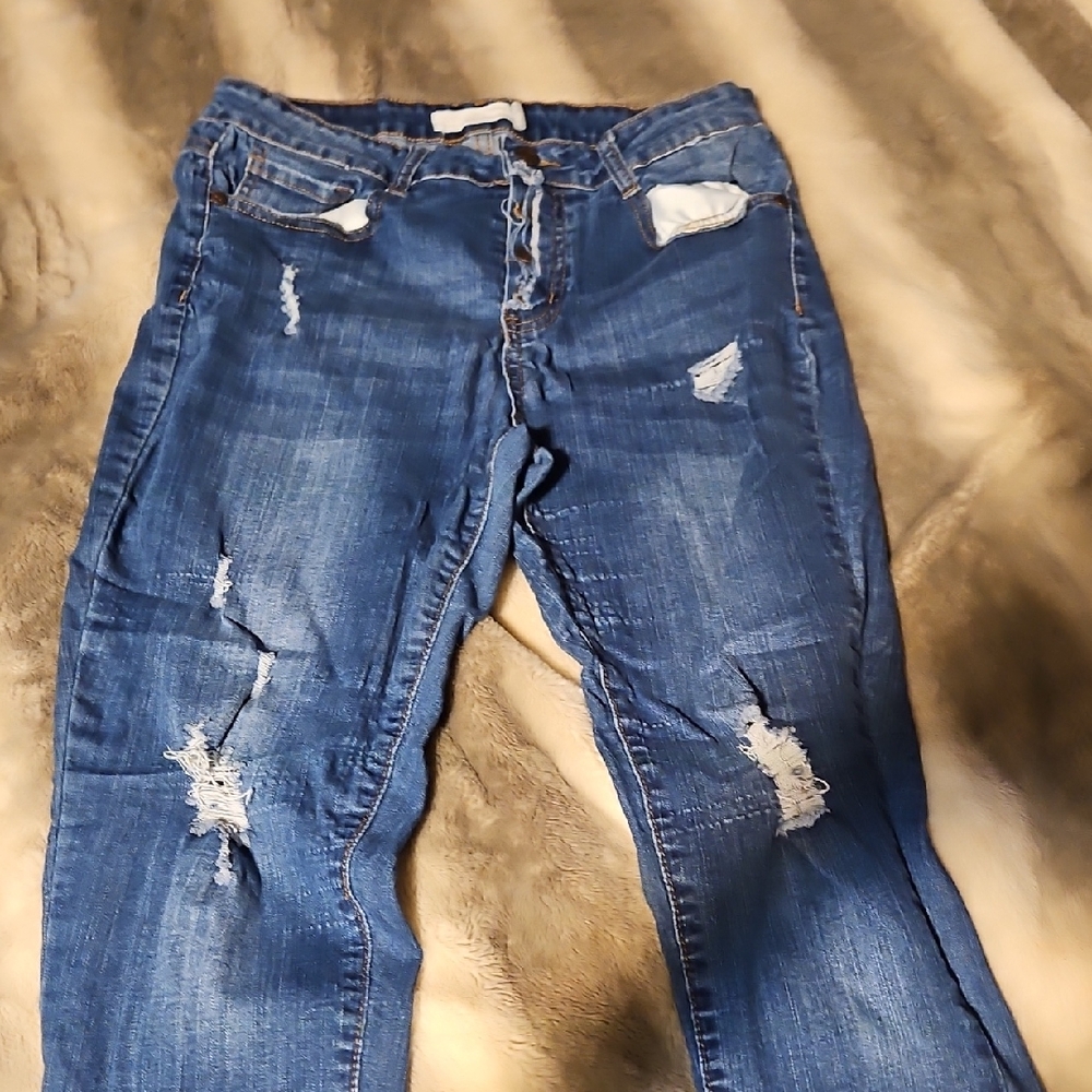 Blue Skinny Distressed Jeans with Ripped Details